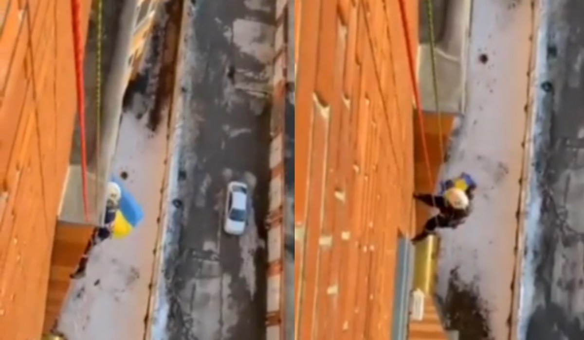 Nowosybirsk: starsza pani wywiesiła ukraińską flagę, zamknęła drzwi przed służbami, zdejmować ją musieli alpiniści