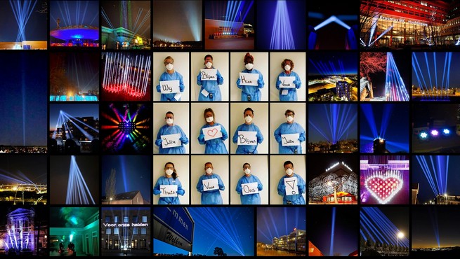 Technicy estrady robią "światło do nieba" reflektorami w podziękowaniu dla medyków